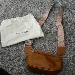 Brand new never used Andar Tan mini waymaker Bag with Floral Strap